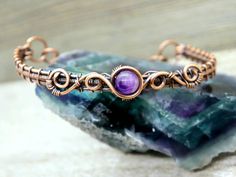 Handmade Adjustable Purple Cuff Bracelet, Purple Cuff Bangle Bracelet As Gift, Unique Purple Cuff Bracelet As Gift, Unique Purple Cuff Bracelet For Gift, Purple Metal Bracelets As Gift, Purple Metal Bracelets As A Gift, Adjustable Wire Wrapped Cuff Bracelet Gift, Adjustable Copper Cuff Bracelet, Adjustable Round Copper Cuff Bracelet