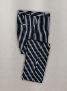 Establish your uber-stylish persona with our Solbiati Linen Pelar Pants, a timeless addition this summer; the linen gives you comfort all day long without losing your cool. So boost your attire with these pairs that provide a never-ending style in your wardrobe. #studiosuits #mensclothingstyle #menswear #mensoutfits #mensattire #gentlemanstyle #classymen #elegantmen #mensstyle #mensfashion#pants#trend#new#stripe Elegant Pinstripe Bottoms For Summer, Elegant Striped Linen Bottoms, Elegant White Pants With Vertical Stripes, Elegant White Striped Pants, Fitted Pinstripe Cotton Pants, Elegant Pinstripe Pants For Summer, Elegant Summer Pinstripe Pants, Classic Bottoms With Vertical Stripes For Summer, Fitted Blue Pants With Vertical Stripes