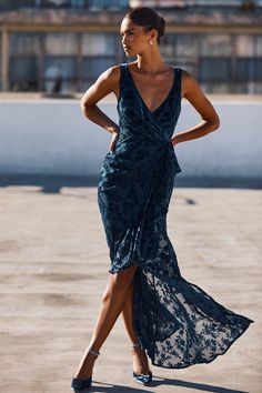 You'll have everyone fascinated with your effortless entrance in the Lulus Enchanting Impression Teal Blue Floral Velvet Ruffled Maxi Dress! Elegant woven chiffon, with an ethereal burnout velvet floral motif throughout, shapes a surplice neckline, wide tank straps, and a lightly gathered bodice with an alluring, deep V-back. Ruffle-trimmed skirt features gathering at the fitted waist before falling to an asymmetrical, high-low silhouette that ends at a maxi hem. Hidden back zipper/clasp. Fit: This garment fits true to size. Length: Floor length. Size medium measures 60" from shoulder to hem. Bust: Great for any cup size. Waist: Fitted - very fitted at natural waist. Hip: Loosely Fitted. Undergarments: May be worn with an adhesive bra, petals, or no bra. Fabric: Fabric has no stretch. Dres Burnout Velvet Dress, Gathered Bodice, High Low Maxi Dress, Burnout Velvet, Lulu Fashion, Surplice Neckline, Adhesive Bra, Brown Velvet, Ruffled Maxi Dress