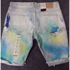 Smoke Rise Mens Size 40 Cut Off Graphics Paint Splattered Denim Shorts Nwt Casual Paint Splatter Streetwear Bottoms, Distressed Multicolor Bottoms For Spring, Multicolor Distressed Bottoms For Spring, Spring Multicolor Distressed Bottoms, Casual Relaxed Fit Bottoms With Paint Splatter, Multicolor Distressed Denim Bottoms, Blue Ripped Shorts For Streetwear, Faded Shorts For Summer Streetwear, Blue Distressed Cotton Shorts