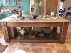 a large kitchen island in the middle of a room