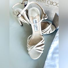 Color: White Satin Jimmy Choo Lilah 100 Sandals In White Satin, Size 37 Leather Lining Leather Sole Round Open Toe Ankle Strap Heel: 100cm-4" Platform: 2cm-1" Made In Italy Chic Fitted Sandals For Wedding, Classic Closed Toe Wedding Sandals, Classic Ankle Strap Party Wedding Shoes, Classic Ankle Strap Wedding Shoes For Party, Luxury Wedding Sandals With Heel Strap, Luxury Fitted Ankle Strap Wedding Shoes, Classic Ankle Strap Sandals For Wedding, Classic Wedding Heels With Heel Strap, Chic Almond Toe Wedding Sandals