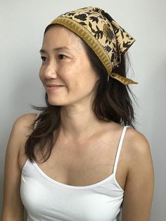 This natural style multipurpose bandana is simple and beautiful, yet functional piece of hair accessory.Hair scarfNeck bandana/scarfPonytail tieMade with lots of love and attention.Ready to ship.  *100% soft cotton *Handmade with vintage Indonesian cloth*W31 inches, H 13 inches*Lined with wire so that turban is bendable and adjustable.*Spot clean*Be creative and have fun!*Great gift *due to the nature of this product, this is non-return/refundable. Thank you so much for your understanding.* Traditional Headscarf As Headband, Bohemian Bandana Print Headscarf For Beach, Yellow Bohemian Bandana For Summer, Festival Bandana Headband One Size, Bohemian Headband Style Headscarf For The Beach, Festival Headband Bandana One Size, Bohemian Bandana Headband For Festival, Bohemian Bandana Styled As Headband For Festivals, Bohemian Adjustable Headscarf With Matching Headband