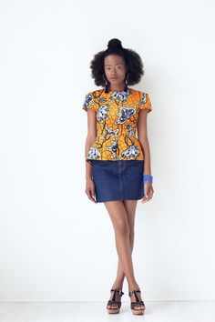 Jodi African Print Peplum Top - Yellow Trendy Short Sleeve Top For Summer Workwear, Trendy Summer Short Sleeve Top For Workwear, Fitted Short Sleeve Top For Spring, Fitted Short Sleeve T-shirt For Day Out, Stretch Short Sleeve Blouse For Day Out, Chic Orange Short Sleeve Top, Yellow Stretch Short Sleeve Top, Chic Fitted Short Sleeve Top For Spring, Spring Workwear Puff Sleeve Top