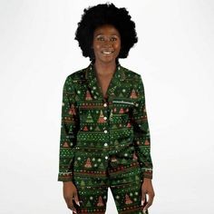 Indulge in the luxury you truly deserve. Treat yourself to a remarkable night's sleep this Holiday Season with our exquisite Christmas Tree African Print satin pajama set, adorned with a captivating Christmas Trees. Crafted to offer unparalleled comfort, these pajamas will have you feeling like royalty as you slip into a tranquil slumber.Experience the unmatched softness of our satin fabric, akin to the gentle touch of butter on your skin. The supple, satiny texture guarantees you'll ascend to c Holiday Long Sleeve Sleepwear For Pajama Party, Christmas Long Sleeve Loungewear Sleepwear, Christmas Long Sleeve Sleepwear Loungewear, Holiday Long Sleeve Home Sets, Green Long Sleeve Sleepwear For Holiday, Holiday Bedtime Sets With Long Sleeves, Holiday Long Sleeve Loungewear Sets, Green Long Sleeve Holiday Sleepwear, Green Holiday Sleepwear For Winter