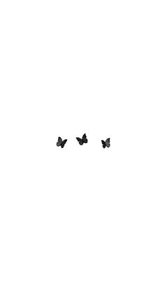 three black birds flying in the sky together