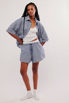 Keep it breezy in this airy set from Intimately, featuring an oversized short-sleeve button down and laid-back boxer shorts, all in a sweet gingham print for the perfect matchy moment. **Fit:** Oversized, relaxed **Features:** Lightweight cotton blend, gingham print; Top: Button-front closure, short, wide, drop-shoulder sleeves with cuff details, collared neckline, patch pocket, back pleat; Bottoms: High-rise, mini length, adjustable drawcord waistband **Why We | Checked Out Gingham Set by Intim Summer Sleepwear With Built-in Shorts, Summer Daywear Sleepwear With Built-in Shorts, Casual Gingham Sleepwear For Loungewear, Gingham Cotton Shorts For Daywear, Gingham Bottoms For Summer Loungewear, Summer Gingham Bottoms For Loungewear, Summer Gingham Loungewear Bottoms, Gingham Pajama Shorts For Loungewear, Cotton Gingham Shorts For Loungewear