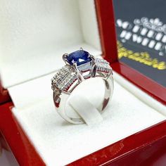 BRAND-NEW!! ONE OF A KIND, HANDCRAFTED RING. EXQUISITE AND FINE CRAFTSMANSHIP! HANDMADE TO LAST FOR AN ETERNITY!! HEIRLOOM PIECE!! PRECIOUS JEWELRY TO BE PASSED ON! PERFECT DRESS RING FOR A LADY OR A GENTLEMAN! 3.67 total carat weight, Certified, Natural CEYLON BLUE SAPPHIRE ring. This ring offers an important statement of who you are with a 3.10 carats, VIVID CORNFLOWER BLUE CEYLON SAPPHIRE. Accentuating the BLUE SAPPHIRE are the 30 F/VS, sparkling natural diamonds! Set in 18K Solid White Gold Luxury Diamond Cut Lab-created Sapphire Rings, Luxury Royal Blue Sapphire Ring, Luxury Sapphire Ring For Gift, Luxury Sapphire Anniversary Ring, Luxury Formal Rings With Lab-created Sapphire, Luxury Hallmarked Blue Rings, Luxury Royal Blue Sapphire Round Ring, Luxury Tanzanite Ring With Diamond Cut, Luxury Tanzanite Promise Ring