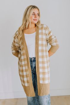 This timeless cardigan is designed with a gingham plaid pattern and finished with ribbed trim. It features long sleeves and an open front design, creating an elegant slim silhouette with a relaxed fit. Perfect for pairing with skirts, jeans, and leggings. Fabric Content: 100% Acrylic. Size Info: Size Info: US Size Range: Small 0-4 Medium 6-8 Large 10-12 XL 14-16 See size chart for approximate measurements. Plaid Cardigan, Front Design, Plaid Pattern, Front Open, Gingham, Size Chart, Fall Outfits, Plaid, Leggings