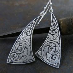 Ornate Engraved Sterling Silver Earrings, Collectible Etched Antique Silver Jewelry, Artisan Carved Sterling Silver Jewelry, Ornate Silver Jewelry With Engraving Option, Artisan Etched Jewelry For Collectors, Artisan Sterling Silver Etched Earrings, Artisan Etched Sterling Silver Earrings, Collectible Etched Sterling Silver Jewelry, Traditional Jewelry With Engraving Option For Anniversary