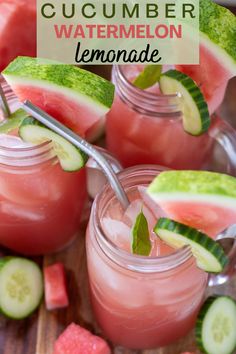 cucumber watermelon lemonade in mason jars with spoons and slices of watermelon