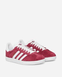 adidas Gazelle Sneakers Collegiate Burgundy / Cloud White.The passion for sport runs through your veins and between the fibers of these adidas Gazelle. The iconic 3-Stripes silhouette features a colorway and logo that shows your support. The famous low-cut suede upper finishes the look..Suede Upper.Leather Overlays.OrthoLite® Sockliner.Rubber Outsole.Style Code: B41645 Chanel Ballerina, Adidas Gazelle Sneaker, Cloud White, The Passion, Adidas Gazelle, Mens Sportswear, Sneaker Collection, Low Cut, Men's Sneakers