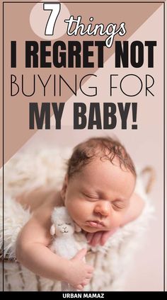 a baby laying on top of a blanket with the words 7 things i regret not buying for