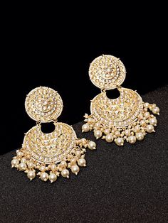 These exquisite gold-toned 2-layer crescent-shaped chandbali earrings come with kundan stone studs & beads, are gold-plated, and are secured with a post and back closure. These handcrafted chandbalis can be styled with any ethnic outfit for a dramatic impact, or an evening outfit to complete a dazzling look. Eitherway, complements are all yours! Product color may vary based on the monitor or screen you are using.See FAQ for more details. Size Length: 11 cm Details Material: BrassStones: Kundan & Luxury Bridal Chandbali Earrings With Tilla, Luxury Chandbali Earrings With Cutdana, Luxury Chandbali Cutdana Earrings, Festive Gold Hoop Earrings With Pearl Drop, Gold Hoop Earrings With Pearl Drop For Festivals, Festival Chandbali Hoop Earrings With Pearl Drop, Chandbali Chandelier Earrings With Intricate Design For Reception, Chandbali Pearl Drop Earrings, Gold-plated Chandbali Danglers With Pearl Drop