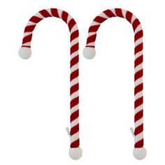 two candy canes with white and red stripes