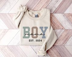 This personalized boy mom sweatshirt is the perfect christmas gift for every boy mom. It's also a great boy mama sweatshirt for mothers days, birthday or for birth. boy mom sweatshirt, momma sweatshirt, boy mama sweatshirt, boy mom, custom mama sweatshirt, mama crewneck, mom christmas gift, in my mom era, mama sweatshirt with kid name, expecting mom gift, first time mom gift, first mothers day, mama sweater, mama crewneck sweatshirt, mama sweatshirt, new mom gift HELLO YOU! :) I am so happy to s Momma Sweatshirt, Boy Mom Sweatshirt, Mothers Days, In My Mom Era, Mama Crewneck, Mama Sweater, Boy Mama, Expecting Mom Gifts, Mom Era