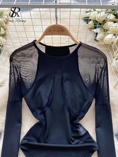 SPECIFICATIONSBrand Name: SR.SingreinyDecoration: hollow outStyle: Sexy & ClubElasticity: Non StrechOrigin: Mainland ChinaCN: GuangdongSeason: All seasonFabric Type: MeshPattern Type: SolidMaterial: POLYESTERMaterial: AcetateMaterial: SPANDEXAge: MIDDLE AGEItem Type: Rompers&PlaysuitsPlace Of Origin: China (mainland)Fabric content: 51% (inclusive) - 70% (inclusive)Waist: Mid WaistFit Type: SKINNYGender: WOMENPattern: Cross-pantsRelease Date: Winter 2022Thickness: STANDARDType: Playsuits French Style, Rompers, Mesh, Long Sleeve, Fabric, Black, Patchwork