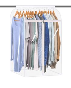 an open closet with clothes and sweaters on hangers