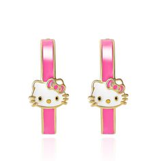 Add a touch of whimsy to your wardrobe with the Sanrio Hello Kitty Brass Flash Yellow Gold Plated Enamel Post Hoop Earrings. These delightful accessories are perfect for any Hello Kitty enthusiast or anyone looking to infuse a playful vibe into their ensemble.

- Material: Brass with a yellow gold-plated finish
- Color: Gold with pink enamel
- Gender: Female
- Age Group: Adult
- Design: Features the iconic Hello Kitty motif in vibrant pink enamel

These earrings are not just jewelry; they're a f Cute Pink Huggie Jewelry, Pink Enamel Hoop Jewelry, Pink Nickel-free Huggie Hoop Earrings, Nickel-free Pink Huggie Hoop Earrings, Pink Huggie Hoop Earrings Nickel Free, Pink Enamel Hoop Earrings, Cute Small Hoop Pink Earrings, Cute Small Pink Hoop Earrings, Playful Gold Enamel Earrings