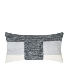 a gray and white striped pillow on a white background