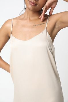 Design Details Care Size & Fit This strappy slip dress has been a best selling style for years - and for good reason! It has a relaxed fit and is made in our luxuriously soft, lightweight and eco-friendly TENCEL™. Layer it over a turtleneck while it's still cold, then wear it with sandals and a jean jacket once the weather warms up. Machine wash cold or up to 86° F / 30° C Hang dry or tumble low heat Dry Clean Optional True to size fit, take your normal size 100% TENCEL™ Modal Vegan Non-toxic, A Minimalist Fashion Chic, Boyfriend Shirt Dress, Minimalist Chic, Lounge Dress, French Seam, Boyfriend Shirt, Built In Wardrobe, Capsule Wardrobe, Jean Jacket