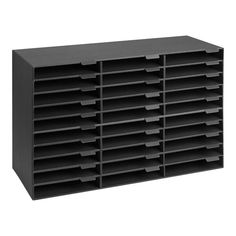 a large black storage unit with many bins on the top and bottom shelves,