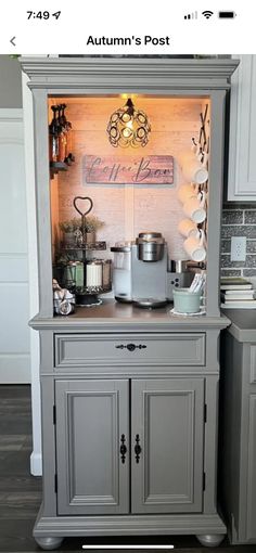 a kitchen cabinet with an open door on it