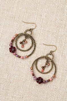 The Czech Glass Collection offers a varied selection of handcrafted earrings, including this statement design, which is distinguished by a deep red Czech Glass focal. Antique Brass (Lead & Nickel Free) Czech Glass 2" with antique brass ear wires We hand select our natural materials, thus there may be slight variations in color and/or size that will not detract from the overall aesthetic. Our unique handcrafted designer jewelry for women is made in America, each design created individually in o Affordable Beaded Czech Glass Earrings, Cheap Czech Glass Beaded Earrings For Party, Cheap Artisan Jewelry Made With Czech Glass, Cheap Artisan Jewelry Made Of Czech Glass, Cheap Artisan Jewelry With Czech Glass, Cheap Elegant Earrings With Czech Glass, Cheap Unique Jewelry With Czech Glass, Cheap Artisan Jewelry In Czech Glass, Cheap Multicolor Czech Glass Earrings