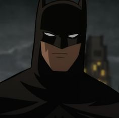 batman in the dark knight returns with his eyes wide open, staring at the camera