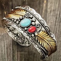 Handcrafted Feather and Stone Bracelet, Boho Silver and Gold Plated, Turquoise and Coral Stone Cuff Bracelet, Native American Adjustable Size Ships in Gift Box FAST shipping Red Southwestern Cuff Bracelet Gift, Red Southwestern Cuff Bracelet As Gift, Western Style Red Jewelry As Gift, Southwestern Blue Cuff Bracelet As Gift, Red Bohemian Cuff Bracelet As Gift, Bohemian Red Cuff Bracelet As Gift, Multicolor Southwestern Style Bracelet For Gift, Southwestern Style Turquoise Bangle As A Gift, Bohemian Style Red Cuff Bracelet As Gift