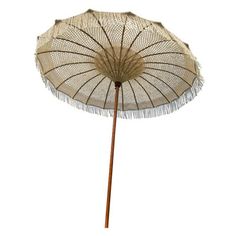 an open umbrella with fringes on it