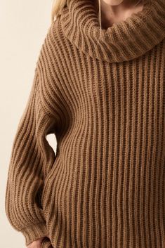 Solid, ribbed knit sweater. Oversized cowl-neck collar Long bubble sleeves. Drop shoulder. Banded rib-knit cuffs and hem. Thigh length. Oversized fit. 100% Polyester. Imported. Designed in LA.. Model wears size S. Oversized Brown Sweater, Oversized Cowl Neck Sweater, Cowl Neck Sweater, Ribbed Knit Sweater, Brown Sweater, Neck Collar, Knit Cuff, Cowl Neck, Chunky Knit