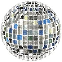 a cross stitch pattern on a white plate with blue, green and grey squares in the center