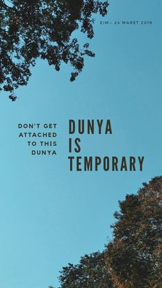 the words dunya is temporary against a blue sky with trees in the foreground