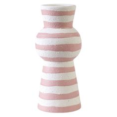 a pink and white striped vase sitting on top of a table