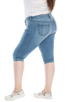 Cut to flatter curves and move with ease, these stretchy capris are right on trend with a faded wash and released raw hems. 18" inseam; 14 1/2" leg opening; 10" front rise; 18" back rise (size Medium) 52% cotton, 29% rayon, 17% polyester, 2% spandex Machine wash, tumble dry Imported Knee-length Cropped Denim Jeans, Stretch Denim Knee-length Jeans, Stretch Knee-length Cropped Denim Jeans, Stretch Knee-length Summer Jeans, Summer Knee-length Stretch Jeans, Medium Wash Stretch Bottoms, Mid-thigh Length, Stretch Medium Wash Cropped Capri Jeans, Medium Wash Knee-length Denim Capris, Stretch Denim Knee-length Shorts