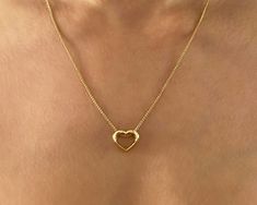 14K solid gold heart pendant minimalist love necklace. geometric 3D heart, valentines day gift.  A unique heart pendant design with a geometric structure paired with a wheat style gold chain which flows through the heart.  Pendant & Chain description: * Pendant height: 0.43'' - 11 mm. * Width: 0.49'' - 12.5 mm. * Materiel: 14K Gold. * Necklace length: 17.7'' - 45 cm. Variations: * White gold may be optional. Feel free to contact me for availability. *If you like the style but did not find just the right jewel for you, or found something you love but you wish it could be a bit different, you are more than welcome to contact me. I accept custom orders and would love to design and create your dream jewel. Other gemstones are available for this design, diamonds, Emeralds, rubies, sapphires, mo Modern Heart Charm Necklace As Gift, Modern Heart Charm Necklace Gift, Modern Open Heart Jewelry For Gifts, Modern Open Heart Jewelry For Gift, Modern Jewelry With Heart Charm As Gift, Modern Jewelry With Heart Charm For Gift, Modern Gold Necklace With Heart Pendant, Modern Double Heart Jewelry For Gifts, Modern Gold Heart Pendant Necklace