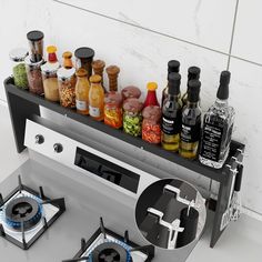 a stove top with spices and condiments sitting on it's burners