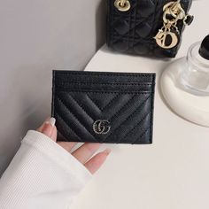 Introducing the epitome of sophistication and style: the Classic GG Wallet Card Holder - Luxury Edition. Crafted with meticulous attention to detail and unparalleled craftsmanship, this accessory seamlessly merges timeless elegance with modern functionality. Made from the finest quality materials, the Classic GG Wallet exudes luxury at every touch. Its iconic GG monogram pattern embossed on premium leather not only showcases impeccable taste but also speaks volumes about your discerning eye for Classic Luxury Wallet With Interior Card Slots, Elegant Bifold Card Holder For Daily Use, Chic Bifold Card Holder With Interior Slots, Trendy Rectangular Formal Wallets, Elegant Wallets With Rfid Blocking As Gift, Chic Rectangular Card Holder With Rfid Blocking, Luxury Elegant Card Holder With Slots, Elegant Card Holder With Rfid Blocking As Gift, Elegant Rfid Blocking Card Holder For Gift