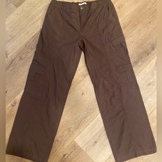 Pacsun Low Rise Baggy Brown Cargo Pants Never Worn Size Large Wide Leg Parachute Pants With Pockets For Vacation, Wide-leg Cargo Pants With Pockets For Vacation, Vacation Wide-leg Cargo Pants With Pockets, Relaxed Fit Cargo Pants With Side Pockets For Vacation, Wide Leg Cargo Pants With Pockets For Vacation, Casual Cargo Pants With Pockets For Vacation, Brown Straight Cargo Pants For Summer, Wide Leg Bottoms With Cargo Pockets For Vacation, Casual Brown Wide-leg Parachute Pants