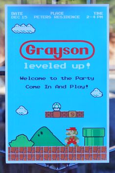 a sign that says, grayson level up welcome to the party come in and play