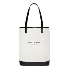 This "Teddy" bucket bag is is crafted of an off-white coated linen with a black printed Saint Laurent logo. The open top bucket bag includes a detachable black leather drawstring insert with a suede pouch. This is a perfect tote for on the go and everyday use, with the distinctive style from Saint Laurent!          Model number: 551595  Coated linen  Smooth black leather details  Printed Saint Laurent Paris logo  Removeable black leather drawstring insert with suede interior and suede pouch  Dou Designer Coated Canvas Bucket Bag For Shopping, Designer Summer Shoulder Bag With Logo, Designer Logo Shoulder Bag For Summer, Everyday Bucket Shoulder Bag With Logo, Logo Bucket Shoulder Bag For Everyday Use, Large Capacity Coated Canvas Bucket Bag For Shopping, Chic Coated Canvas Bucket Bag For Shopping, Coated Canvas Bucket Bag For Shopping, Luxury Bucket Shoulder Bag With Logo