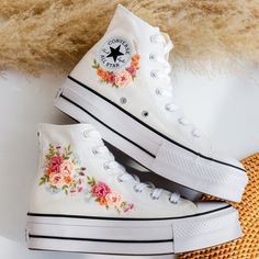 '' Custom Embroidered Platform Sneakers, Wedding Flower Embroidered Converse for Bride, Bridal Flowers Embroidered Shoes, Personalized Bride Sneakers Gift'' 🍀 Price includes Converse Shoes and Floral Embroidery Designs as shown 🍀 🍀 Shoe Type: Converse Platform 🍀 Shoe color: 16. White  1. DETAILS 🍀 You can send me your Converse, Vans, canvas shoes or I can buy them for you. Custom-ordered embroidered Vans and Converse shoes, please wait another 2-4 days. Each pair is hand embroidered to order, please make sure you put in the correct shoe size before you check out. The embroidery is meticulous and does not fade. 🍀 You will receive Vans and Converse shoes with floral embroidery designs as above. 2. PERSONAL EXPRESSION 🍀 Create your unique vibe by your own design of embroidery! In addit White Embroidered Closed Toe Wedding Shoes, Embroidered Round Toe Wedding Shoes, Wedding Low-top Sneakers With Floral Embroidery, Embroidered Sneakers For Wedding, Platform Converse Wedding, Bride Sneakers, Embroidered Vans, Converse Wedding, Boho Wedding Gifts