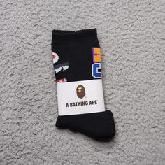 A Bathing Ape Crew Socks Wgm Shark Mouth Tiger Logo Mens Womens Unisex "World Gone Mad" Size: One Size Fits All Color: Black Orange Red Blue Brand New In Packaging. Fast Shipping! 1 Day Shipping And Handling. Sporty Winter Socks For Streetwear, Black Socks For Streetwear In Winter, Black Socks For Winter Streetwear, Casual Cotton Socks For Streetwear, Casual Cotton Streetwear Socks, Comfortable Cotton Socks For Streetwear, Black Breathable Winter Socks, Casual Black Sports Socks, Black Casual Socks For Streetwear