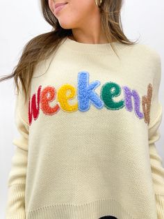 Elevate your weekend style with this fun boxy cream sweater! Adorned with a colorful chenille patch graphic that reads 'weekend', it's the perfect pick for any casual occasion. Pair with leggings and sneakers for the perfect weekend look! Oversized boxy fit Front chenille patch graphic Exposed seams Ribbed neckline, hem and cuffs Leggings And Sneakers, Lake Girl, Chenille Patch, Exposed Seams, Chenille Sweater, Embroidered Sweater, Weekend Style, Cream Sweater, Ribbed Neckline