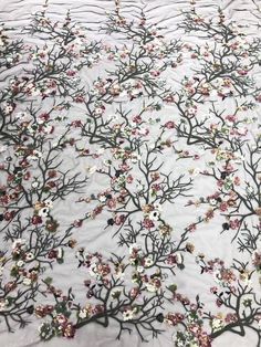 We offer a variety of fashion handmade fabric，those are widely use for wedding dress，garment and fashion cloth. we sell it by yard，our minimum order is 1 yards，and we always package it 15 yards for one roll，the width is 130cm/51 inch Material ： mesh ，Rayon,polyester. Symmetrical embroidery floral pattern, with lovely flowers in the middle, scalloped border. You can also cut and use separately. Perfect for dress, tops, wedding veil. You can split the piece up and have one scalloped edge around th Spring Lace Fabric With Floral Embroidery, Spring Lace Fabric With Floral Print Embroidery, Spring Floral Lace Embroidered Fabric, Elegant Embroidered Lace Fabric For Spring, Elegant Lace Embroidered Fabric For Spring, Spring Floral Print Embroidered Lace Fabric, Elegant Spring Embroidered Fabric With Floral Applique, Elegant Spring Tulle Fabric With Lace Patchwork, Spring Tulle Fabric With Lace Patchwork