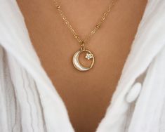 Fine and delicate necklace made of mother-of-pearl and crescent moon necklace with zirconium star. The beaded chain is made of golden stainless steel. Stainless steel is a hypoallergenic and durable material. Your necklace will keep its pretty gold ✨ The necklace is 18in (45cm) long, which is a standard mid-length. If you want a specific length, we can make it custom-made without extra charge, do not hesitate to write to us. DETAILS :  Length: 18in All jewelry is sent in a small cotton pouch. Sh Stone Gold Necklace, Moon And Star Necklace, Necklace Moon, Pearl Stone, Cotton Pouch, Celestial Necklace, Magical Jewelry, Crescent Moon Necklace, Moon And Star