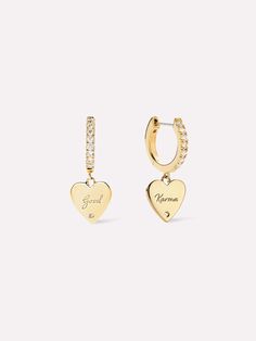 These gold huggie hoop earrings are so much more than a stunning statement piece. Designed in collaboration with influencer, Georgie Fizz, these 14k dipped heart-shaped huggies feature a special message inspired by Georgie’s daughter, Karma. For a powerful look that inspires you to feel beautiful, pair these with our Cassie earrings. • Designed in collaboration with Georgie Fizz • Featuring cubic zirconia gems • 365-day warranty Pearl Threader Earrings, Gold Huggie Hoop Earrings, Colorful Gemstones, Gold Chain Earrings, Diamonds And Pearls, Gemstone Hoop Earrings, White Gold Hoops, Gold Gemstone Ring, Detailed Jewelry