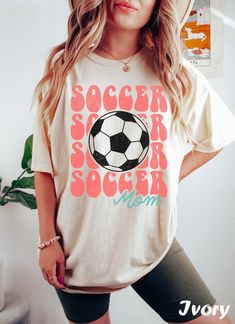 Get ready to rock that casual chic look with our Soccer Shirts For Mom! ❤️ Get retro with this soccer mom tshirt! This design is perfect for all cool soccer moms out there. Show off your retro style and spread some positive vibes with this soccer mom tee. ❤️ Size up, babe! Go 1-2 sizes bigger for that oversized stunner. Elevate your style, own the spotlight, and unleash your fashion power. It's time to rock the room with your effortlessly chic vibe. Get ready to slay in style! Elevate your style Hand Printed Shirt, Soccer Tees, Soccer Mom Shirt, Soccer Mom, Soccer Shirts, Mom Tees, Mama Shirt, Fall Shirts, Style Retro