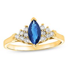 Decorate her finger with this splendid gemstone and diamond ring. Fashioned in warm 14K gold, this elegant style captivates with an 8.0 x 4.0mm marquise-cut bright blue sapphire. Triangular composites of glimmering diamonds flank each side of the center stone to complete the look. Radiant with 1/5 ct. t.w. of diamonds and a brilliant buffed luster, this ring complements her evening-ready wardrobe. Sapphire Ring With Diamond Accents And Marquise Cut, Marquise Sapphire Ring With Prong Setting, Classic Blue Marquise Diamond Ring, Marquise Birthstone Ring In 14k Gold, Sapphire Diamond Ring With Marquise Cut Center Stone, 14k Gold Marquise Birthstone Ring, Marquise Sapphire Promise Ring, Classic Blue Marquise Cut Diamond Ring, Formal Marquise Birthstone Ring